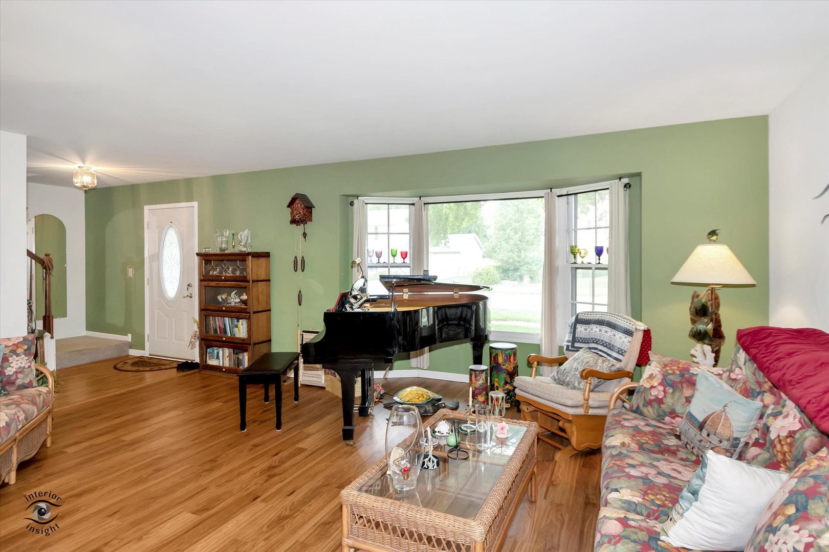 605 Ridge Street Wilmington, IL 60481 - Photo 8 of 26 a living room with furniture a table and a large window