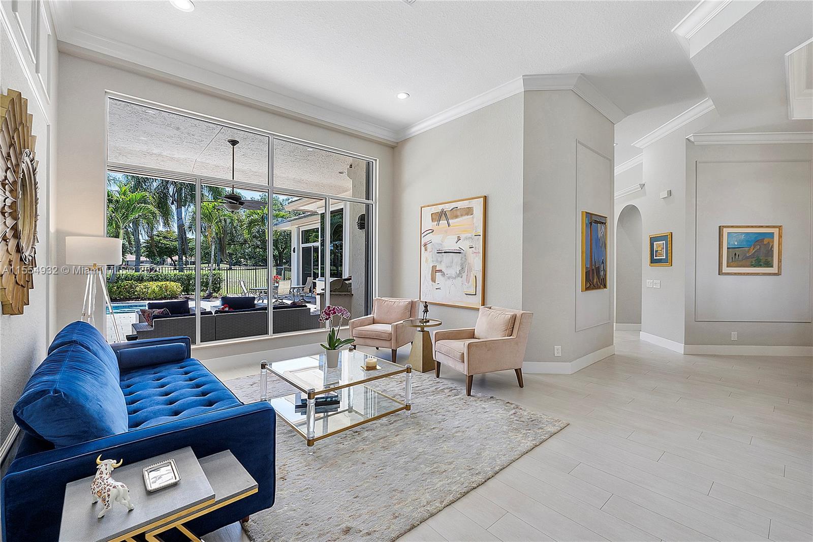 2539 Eagle Run Drive Weston, FL 33327 - Photo 16 of 64 a living room with furniture and a large window