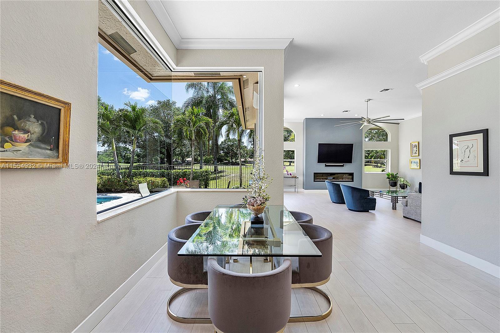 2539 Eagle Run Drive Weston, FL 33327 - Photo 23 of 64 a living room with furniture and a potted plant