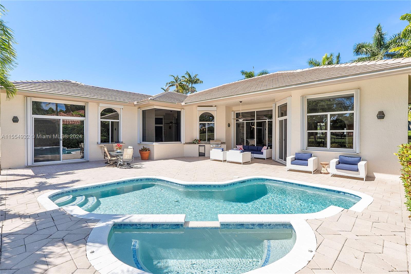 2539 Eagle Run Drive Weston, FL 33327 - Photo 3 of 64 a view of a house with backyard sitting area and porch