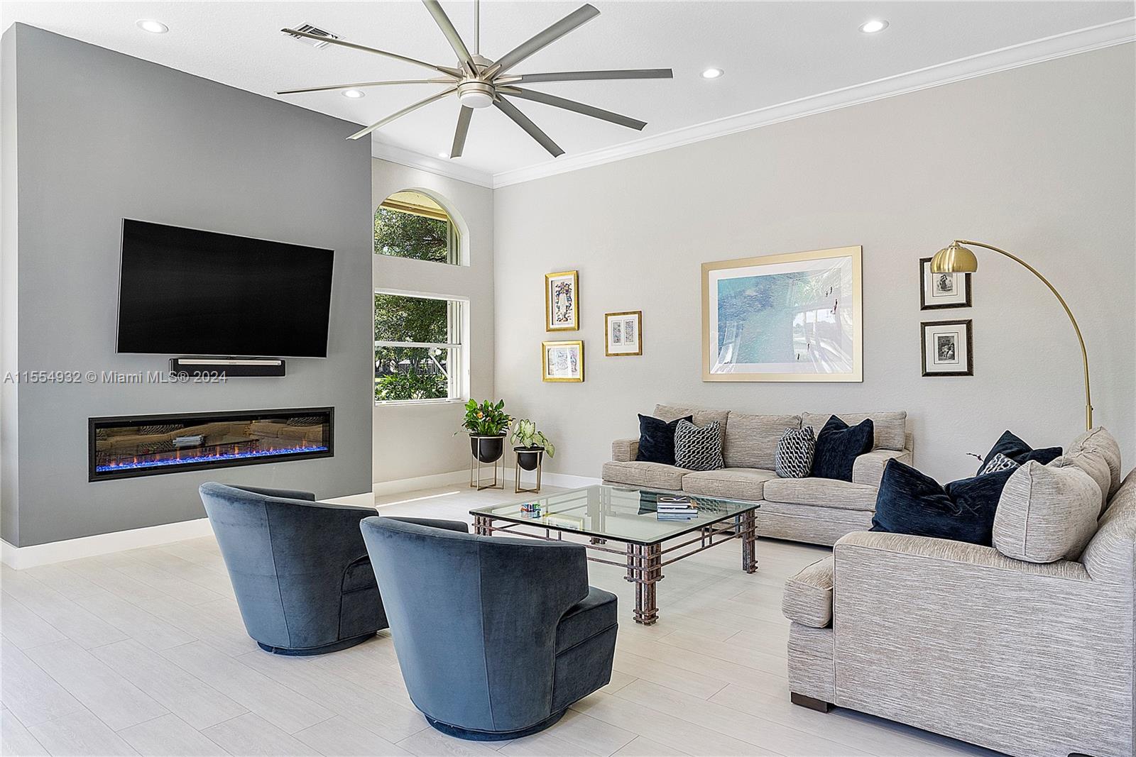 2539 Eagle Run Drive Weston, FL 33327 - Photo 31 of 64 a living room with furniture and a flat screen tv