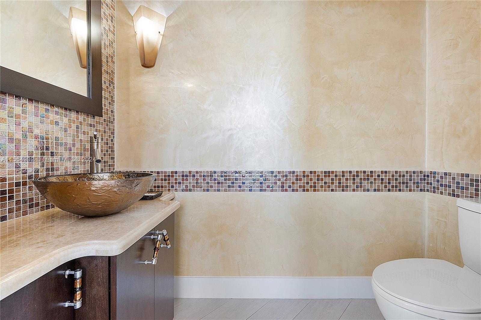 2539 Eagle Run Drive Weston, FL 33327 - Photo 32 of 64 a bathroom with a sink a toilet and shower