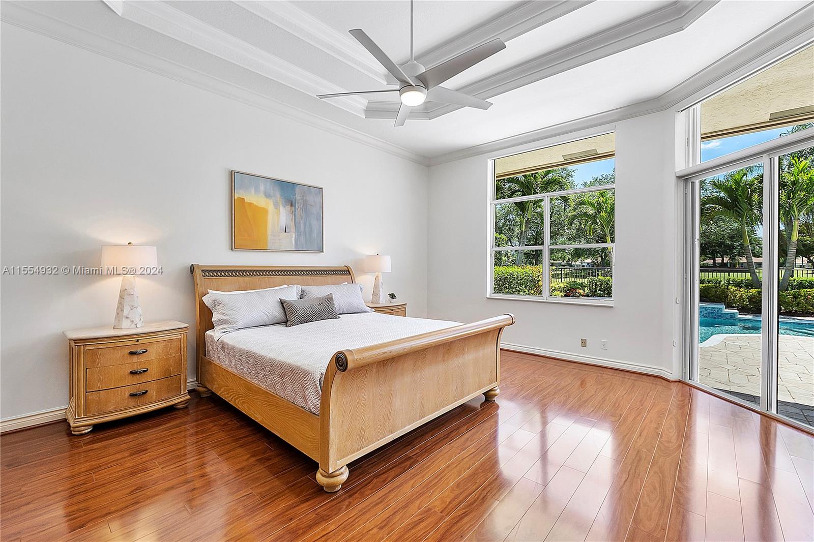 2539 Eagle Run Drive Weston, FL 33327 - Photo 33 of 64 a large bedroom with a bed and window