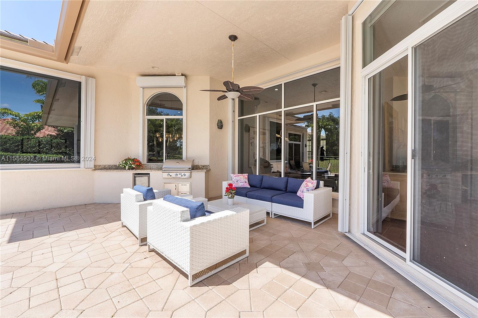 2539 Eagle Run Drive Weston, FL 33327 - Photo 53 of 64 a living room with furniture and a large window