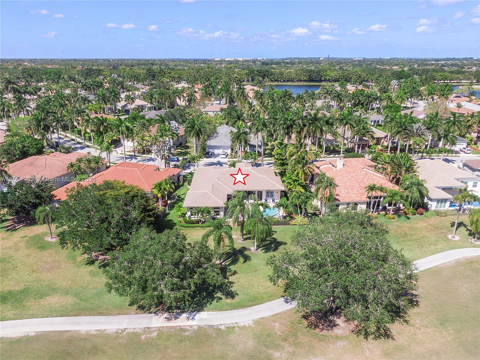 2539 Eagle Run Drive Weston, FL 33327 - Photo 59 of 64 an aerial view of residential houses with outdoor space and swimming pool