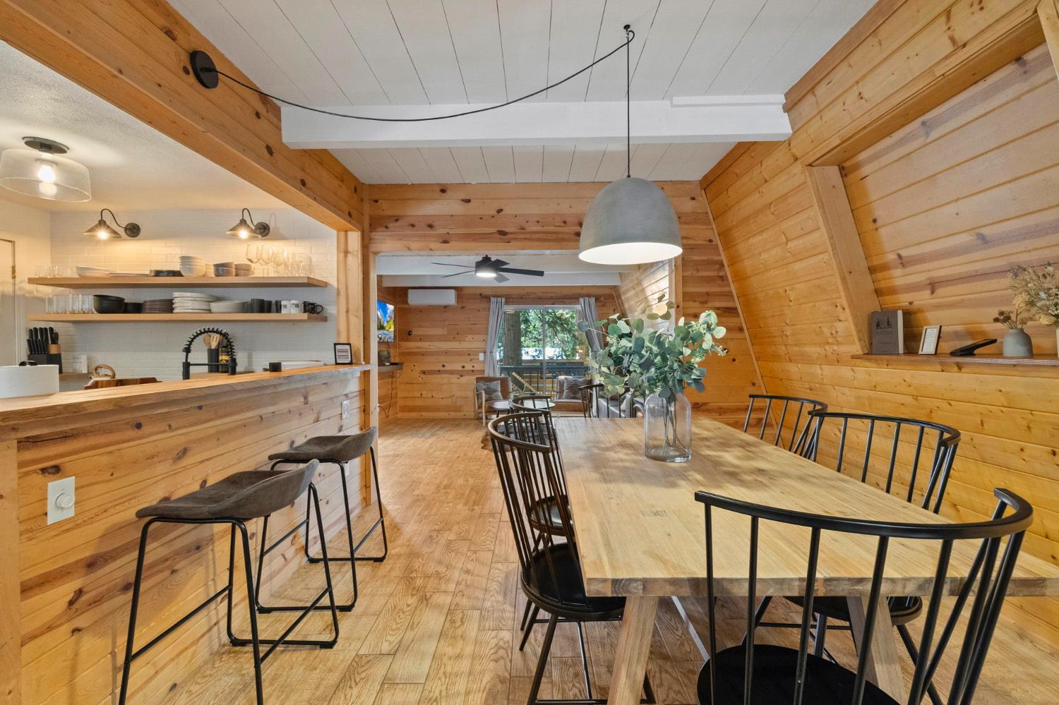 22785 West Ellmaro Road Long Barn, CA 95335 - Photo 14 of 28 a dining room with furniture and a floor to ceiling window