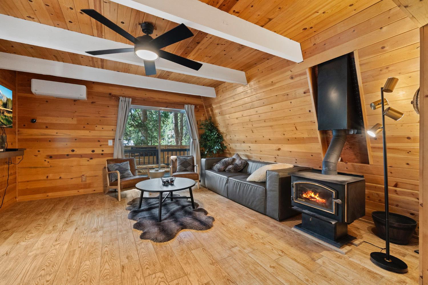 22785 West Ellmaro Road Long Barn, CA 95335 - Photo 16 of 28 a living room with furniture and a fireplace