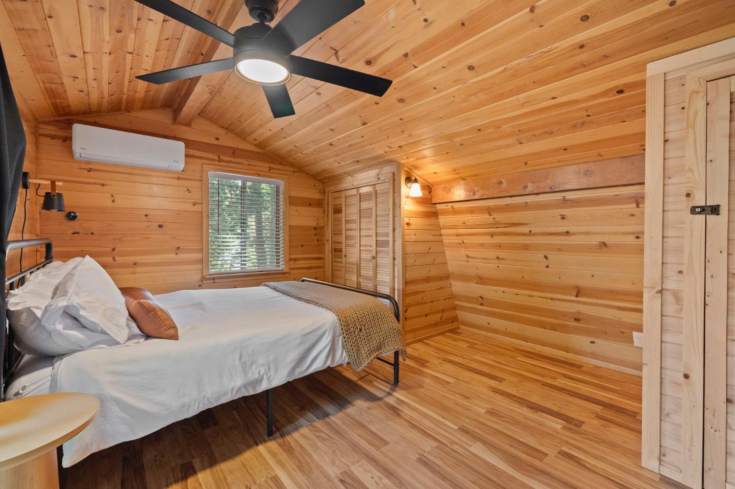 22785 West Ellmaro Road Long Barn, CA 95335 - Photo 23 of 28 a bedroom with a bed and a ceiling fan