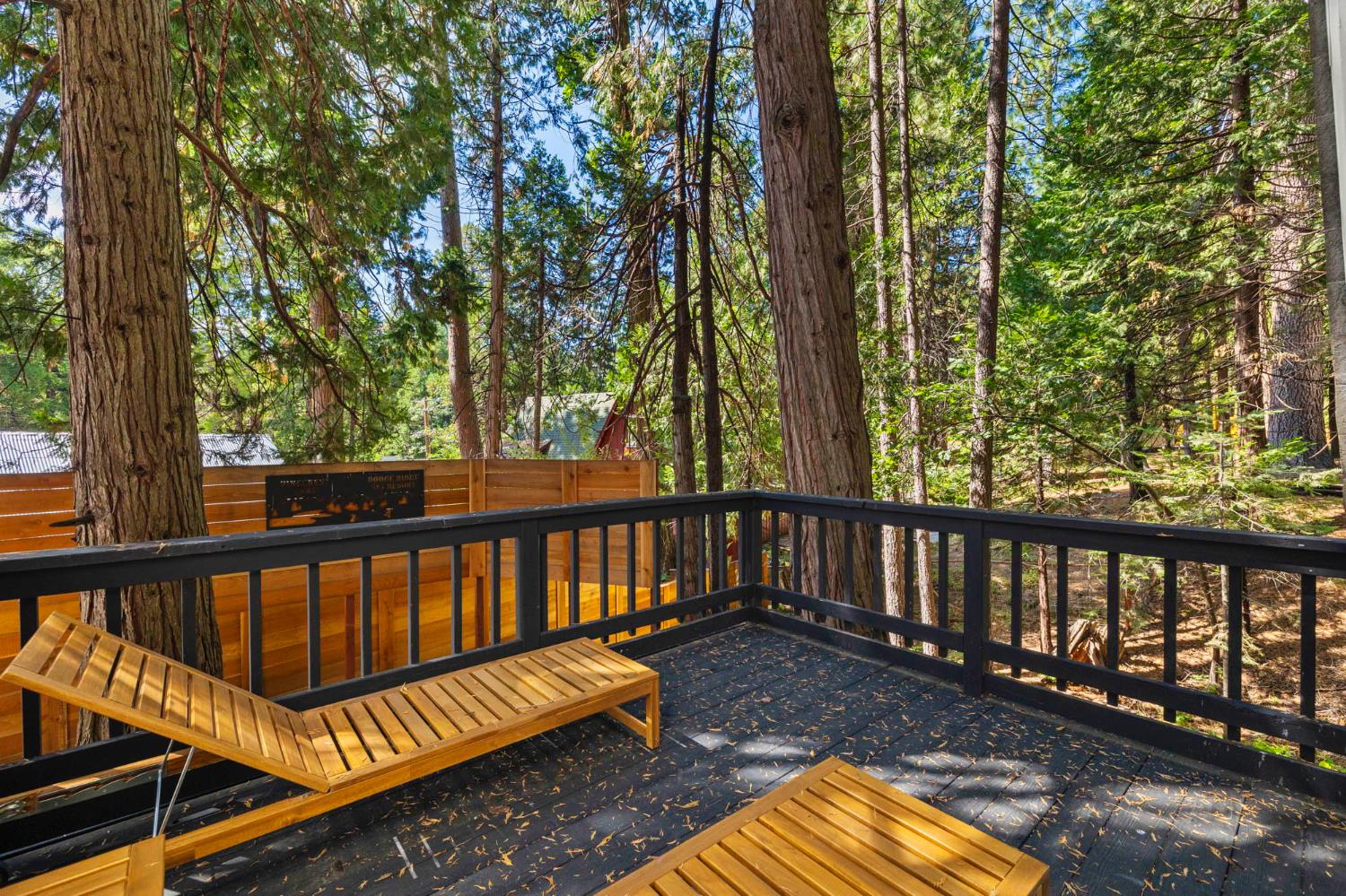 22785 West Ellmaro Road Long Barn, CA 95335 - Photo 27 of 28 a view of a wooden deck with a backyard