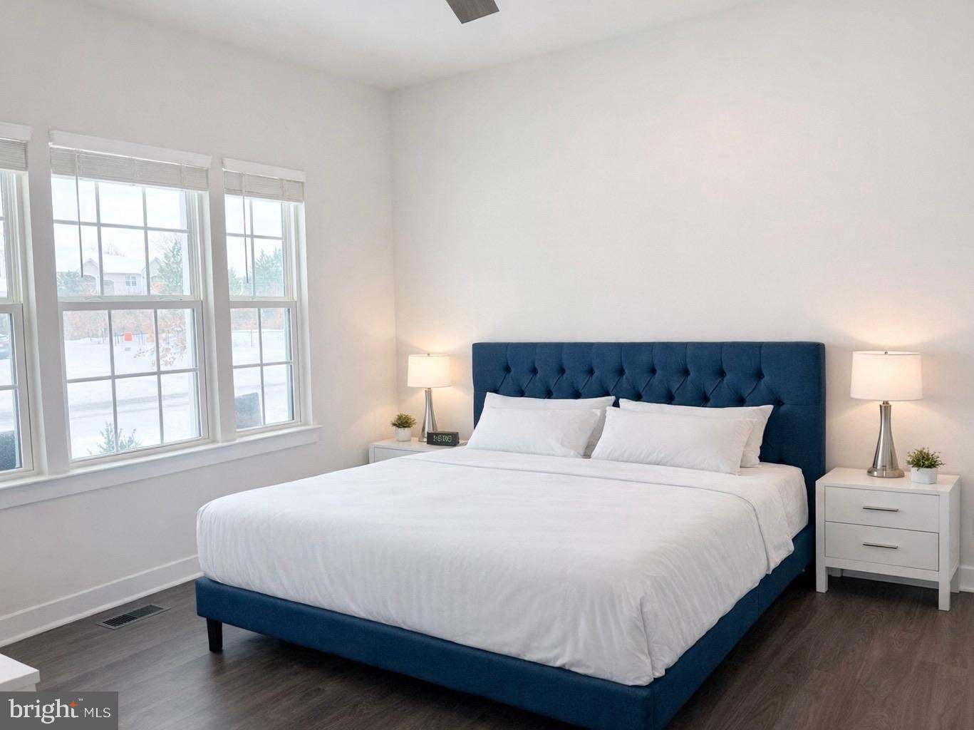 11360 Wheeler Ridge Drive Manassas, VA 20109 - Photo 13 of 32 Serene bedroom with natural light and style.