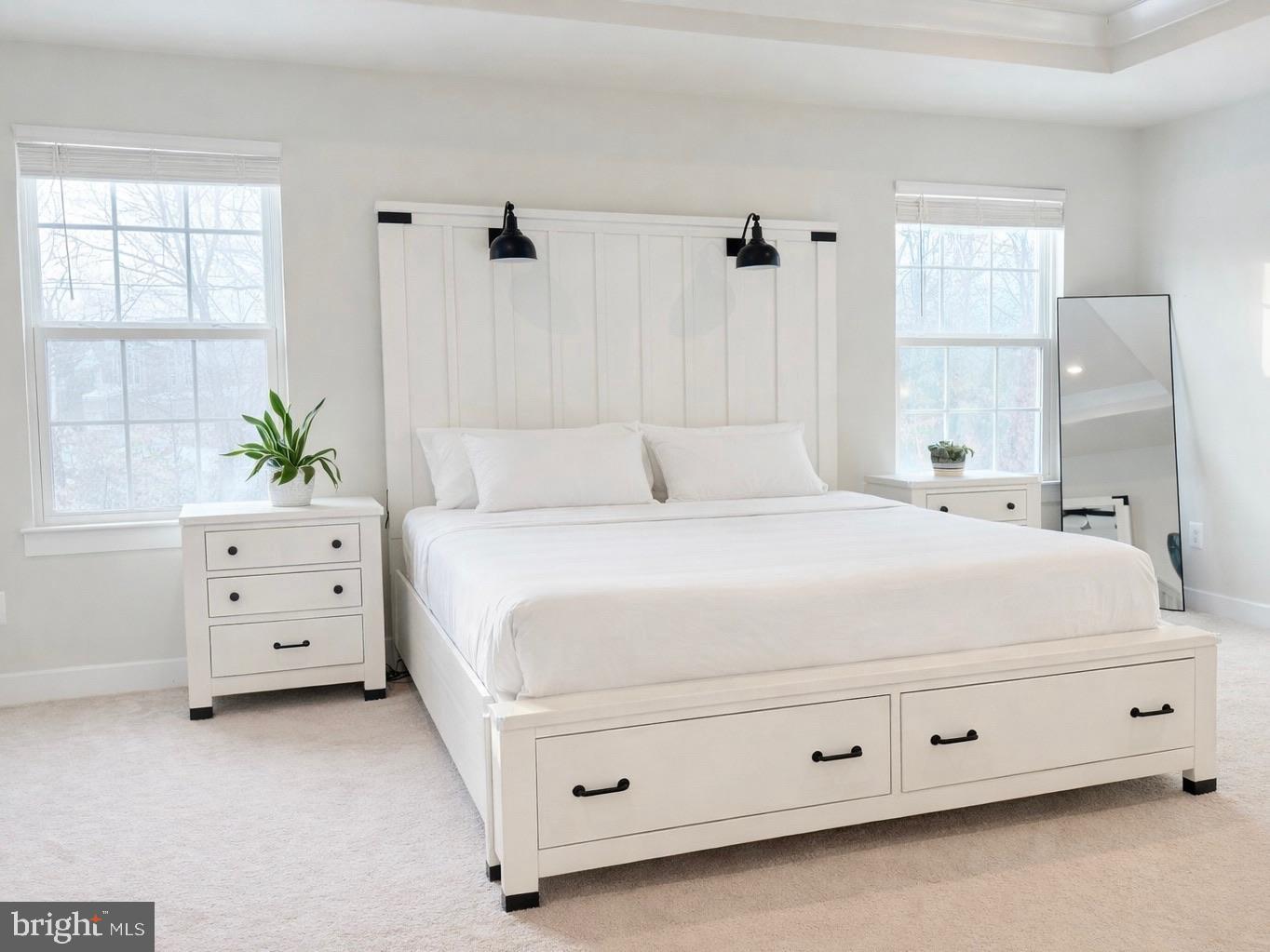 11360 Wheeler Ridge Drive Manassas, VA 20109 - Photo 14 of 32 Serene white bedroom with natural light.