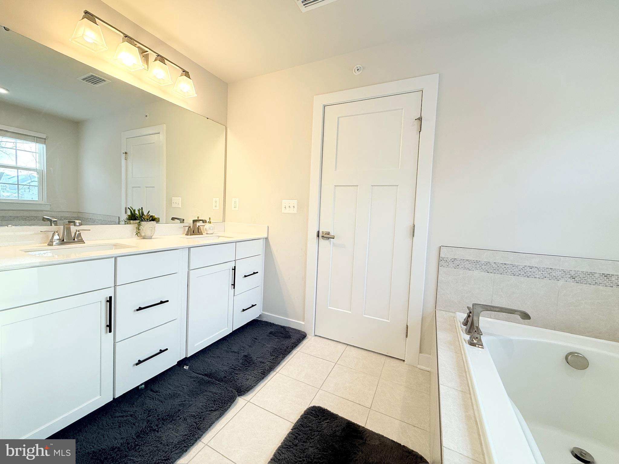 11360 Wheeler Ridge Drive Manassas, VA 20109 - Photo 17 of 32 Modern bathroom with elegant finishes.