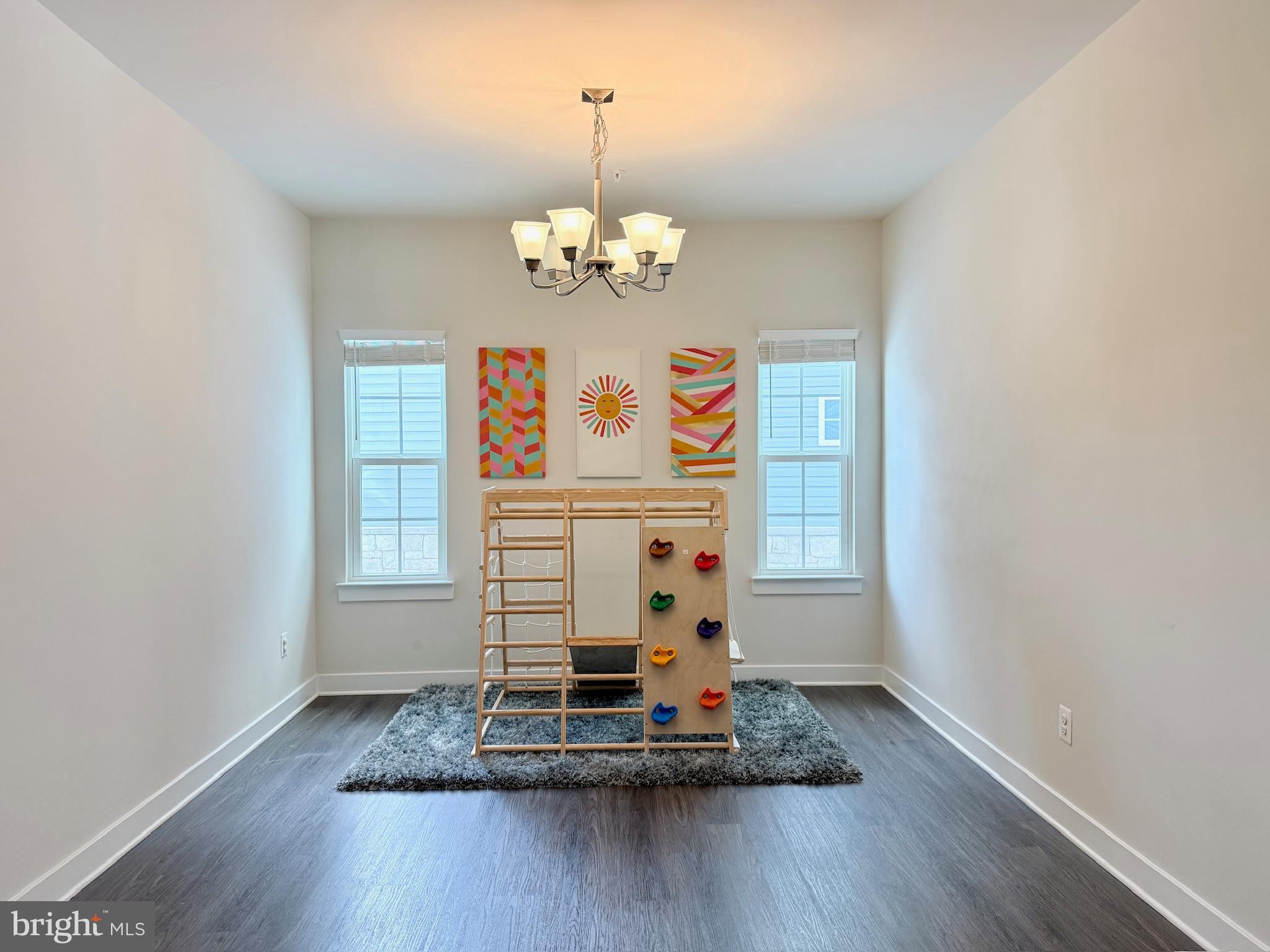 11360 Wheeler Ridge Drive Manassas, VA 20109 - Photo 10 of 32 Bright playroom with colorful art and climbing ...