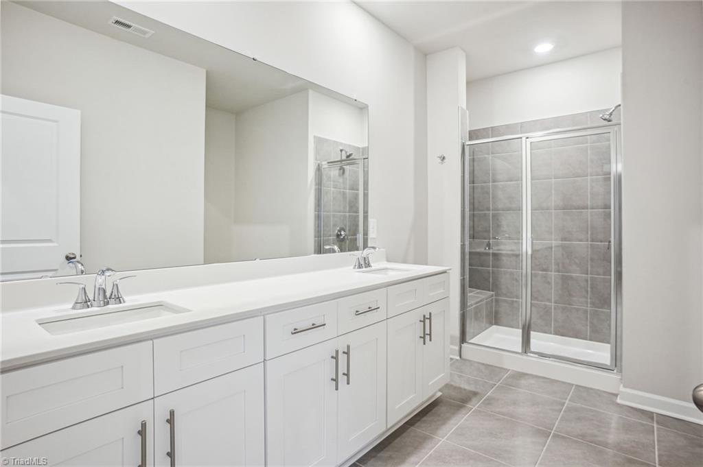 219 Nelson Crk Road Mocksville, NC 27028 - Photo 9 of 12 Photo is not of the actual home, but is an inspirational photo of builder’s model home and may depict options, furnishings, and/or decorator features that are not included