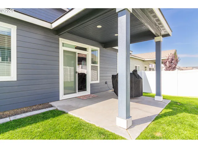 a view of a backyard with a garden