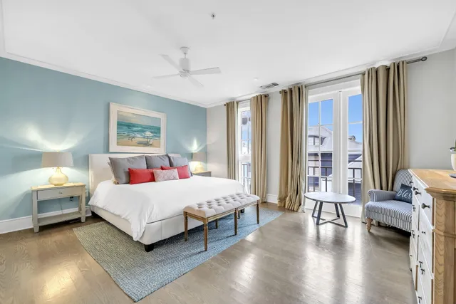 a bedroom with a bed and a night stand