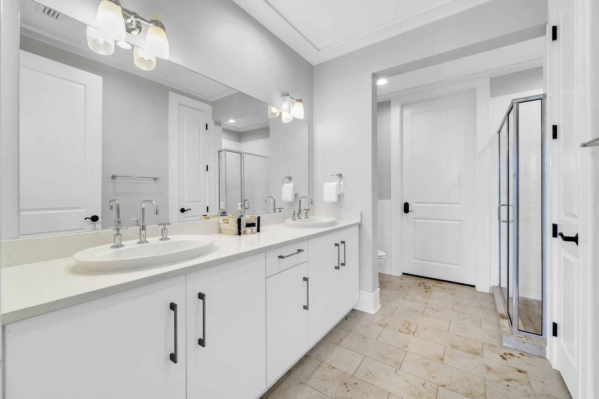 82 South Barrett Square, Unit 3E Inlet Beach, FL 32461 - Photo 20 of 56 a spacious bathroom with a double vanity sink mirror and shower