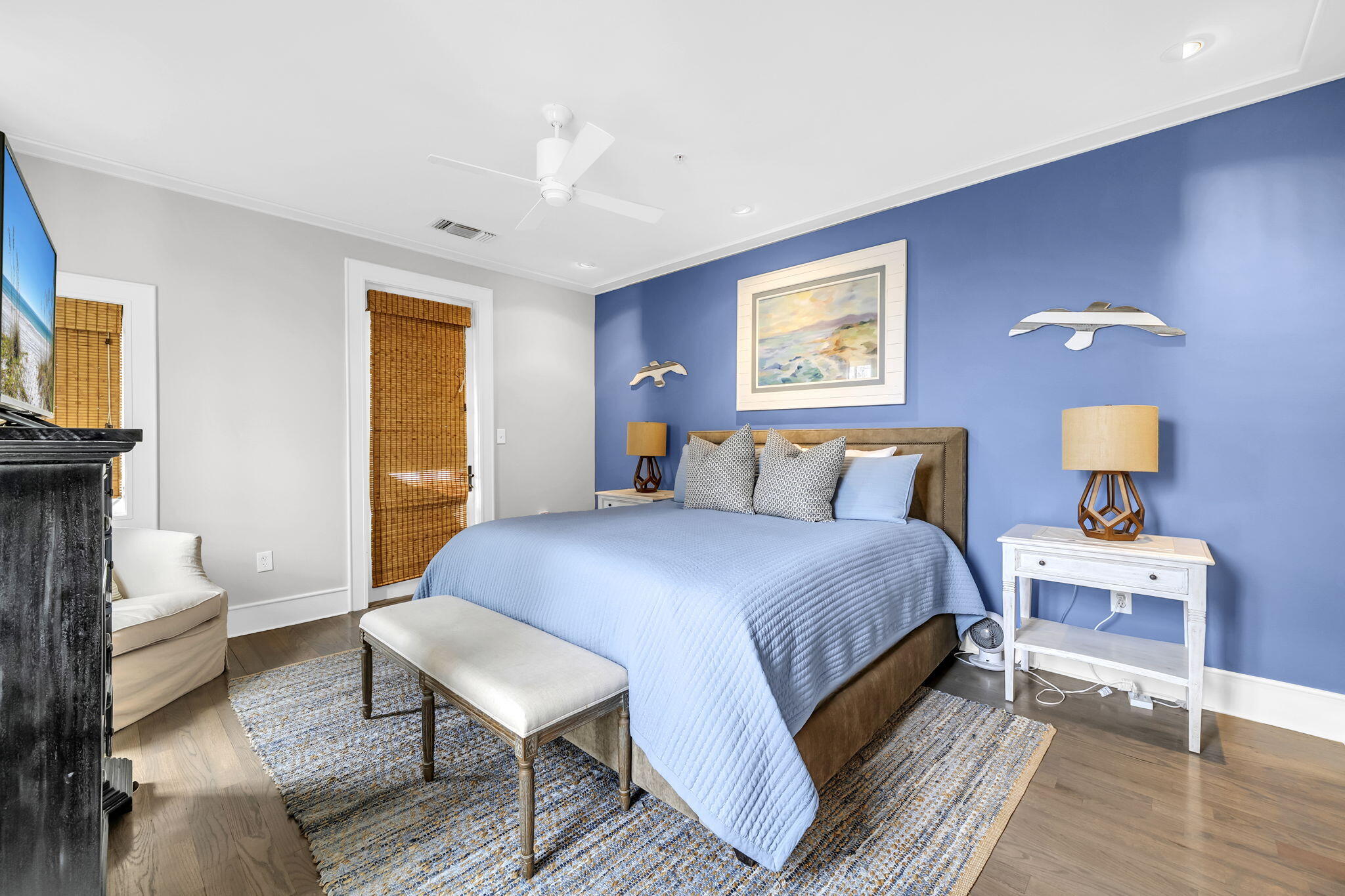 82 South Barrett Square, Unit 3E Inlet Beach, FL 32461 - Photo 22 of 56 a spacious bedroom with a bed and wooden floor