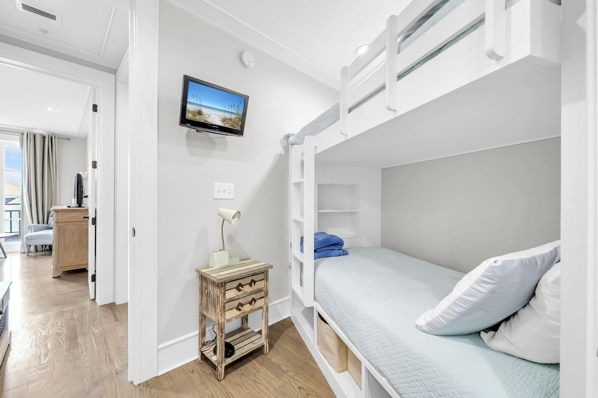 82 South Barrett Square, Unit 3E Inlet Beach, FL 32461 - Photo 26 of 56 a bedroom with a bed and a flat screen tv