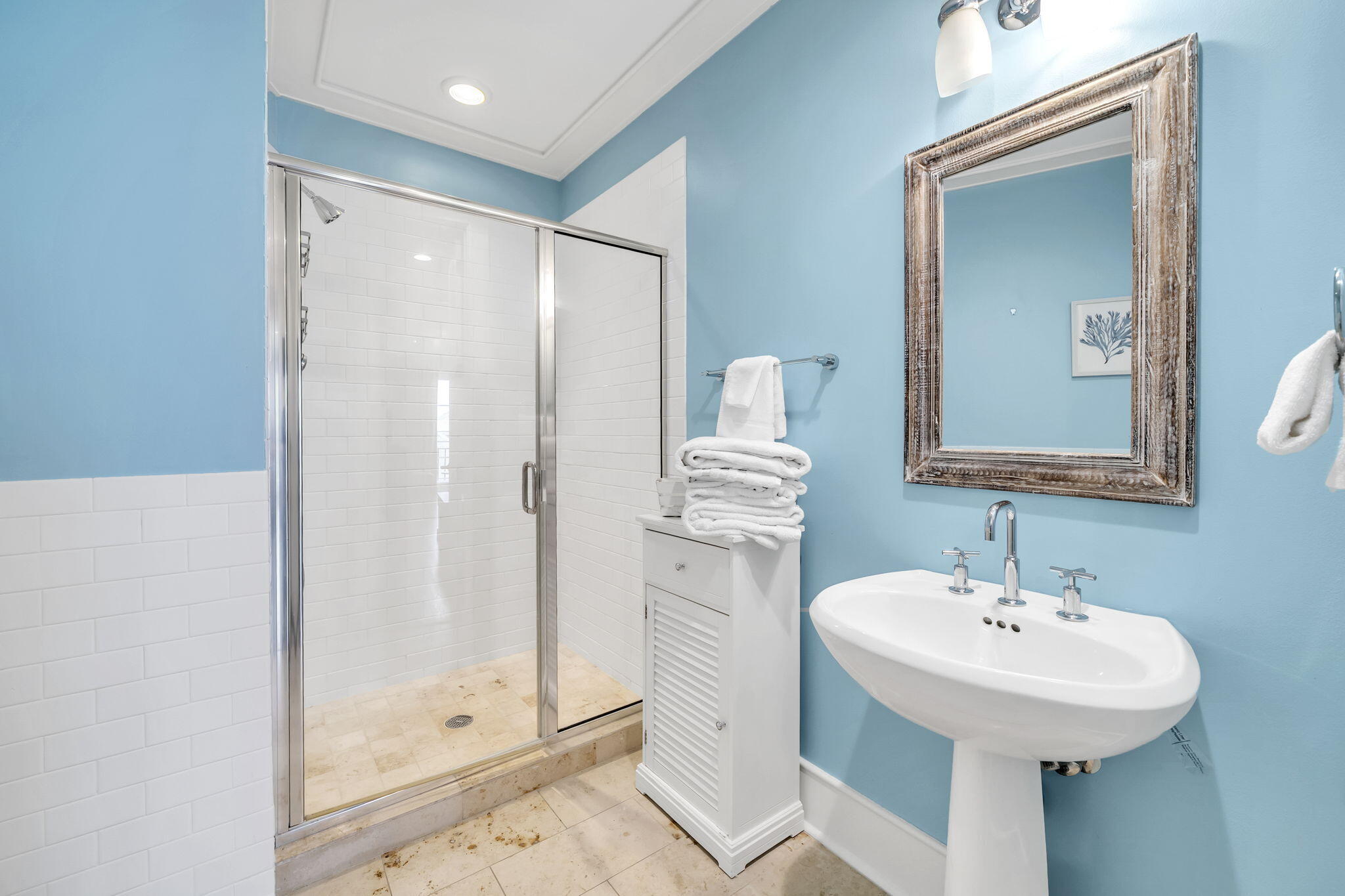 82 South Barrett Square, Unit 3E Inlet Beach, FL 32461 - Photo 28 of 56 a bathroom with a sink a mirror and a shower