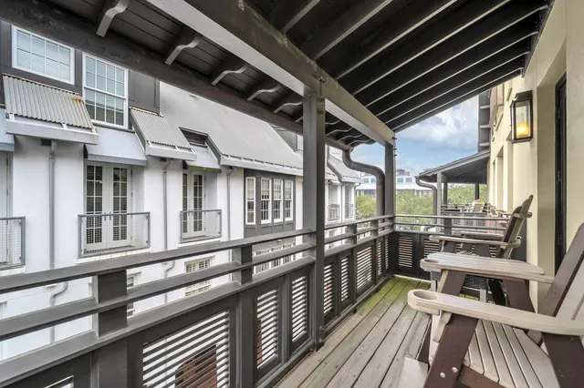 a view of a building with a large windows and stairs