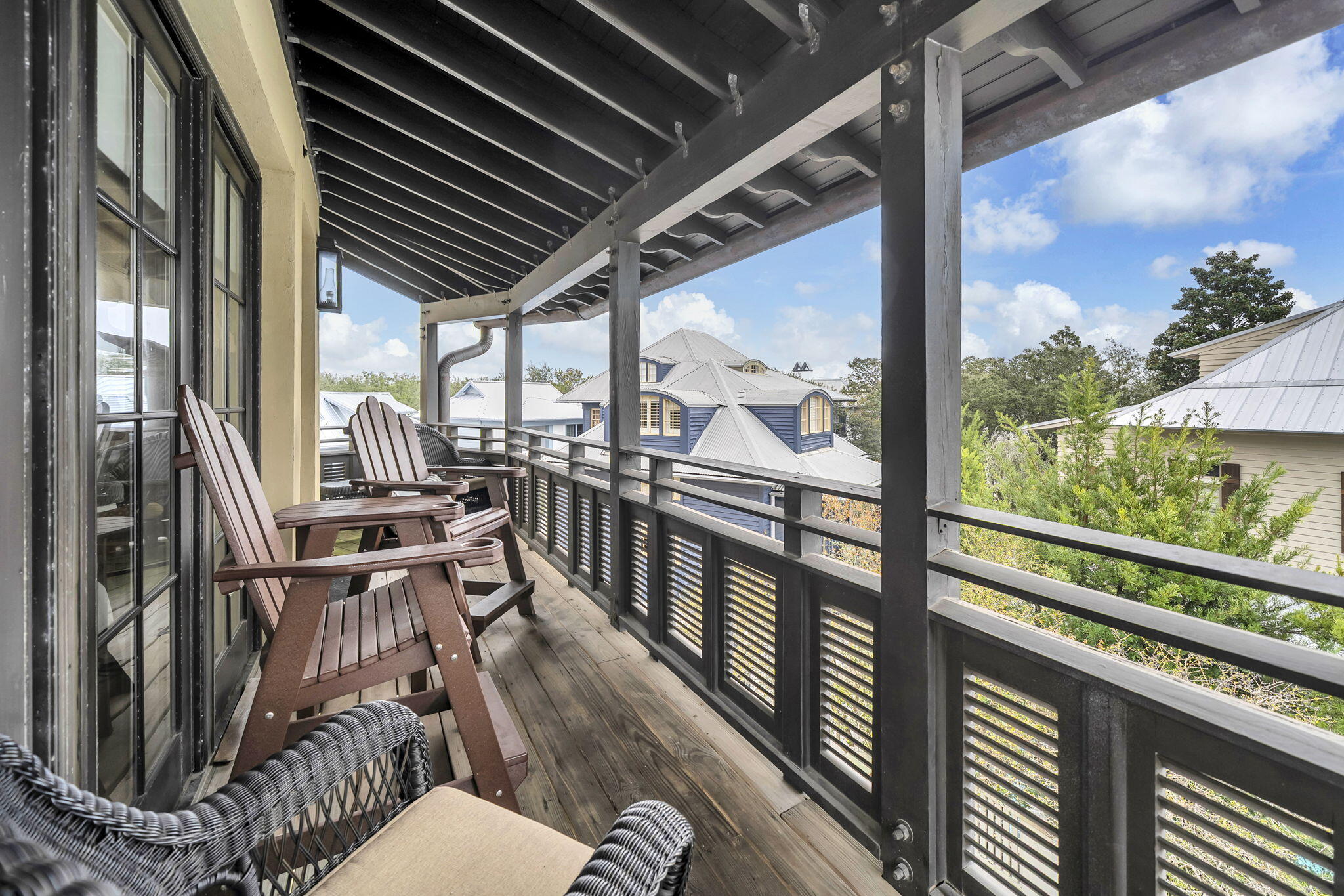 82 South Barrett Square, Unit 3E Inlet Beach, FL 32461 - Photo 36 of 56 a view of a porch with furniture
