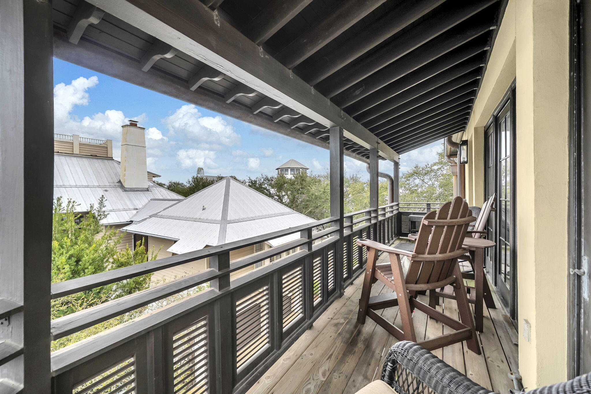 82 South Barrett Square, Unit 3E Inlet Beach, FL 32461 - Photo 38 of 56 a view of a balcony with furniture