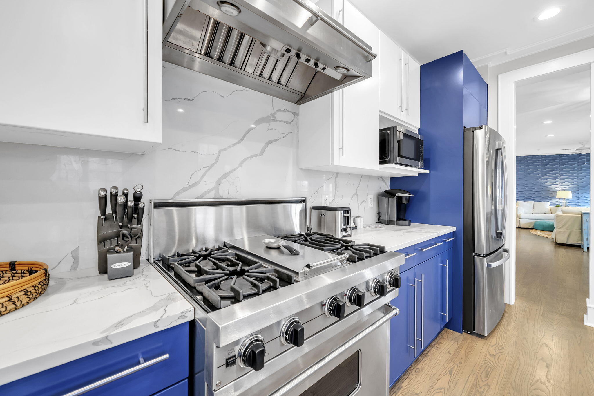 82 South Barrett Square, Unit 3E Inlet Beach, FL 32461 - Photo 6 of 56 a kitchen with stainless steel appliances granite countertop a stove and a sink