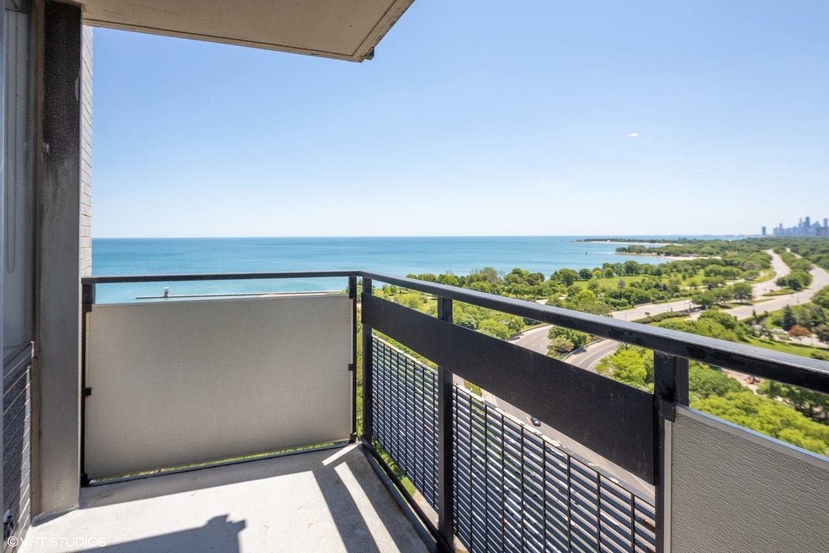 5701 North Sheridan Road, Unit 20J Chicago, IL 60660 - Photo 5 of 25 a view of balcony with furniture