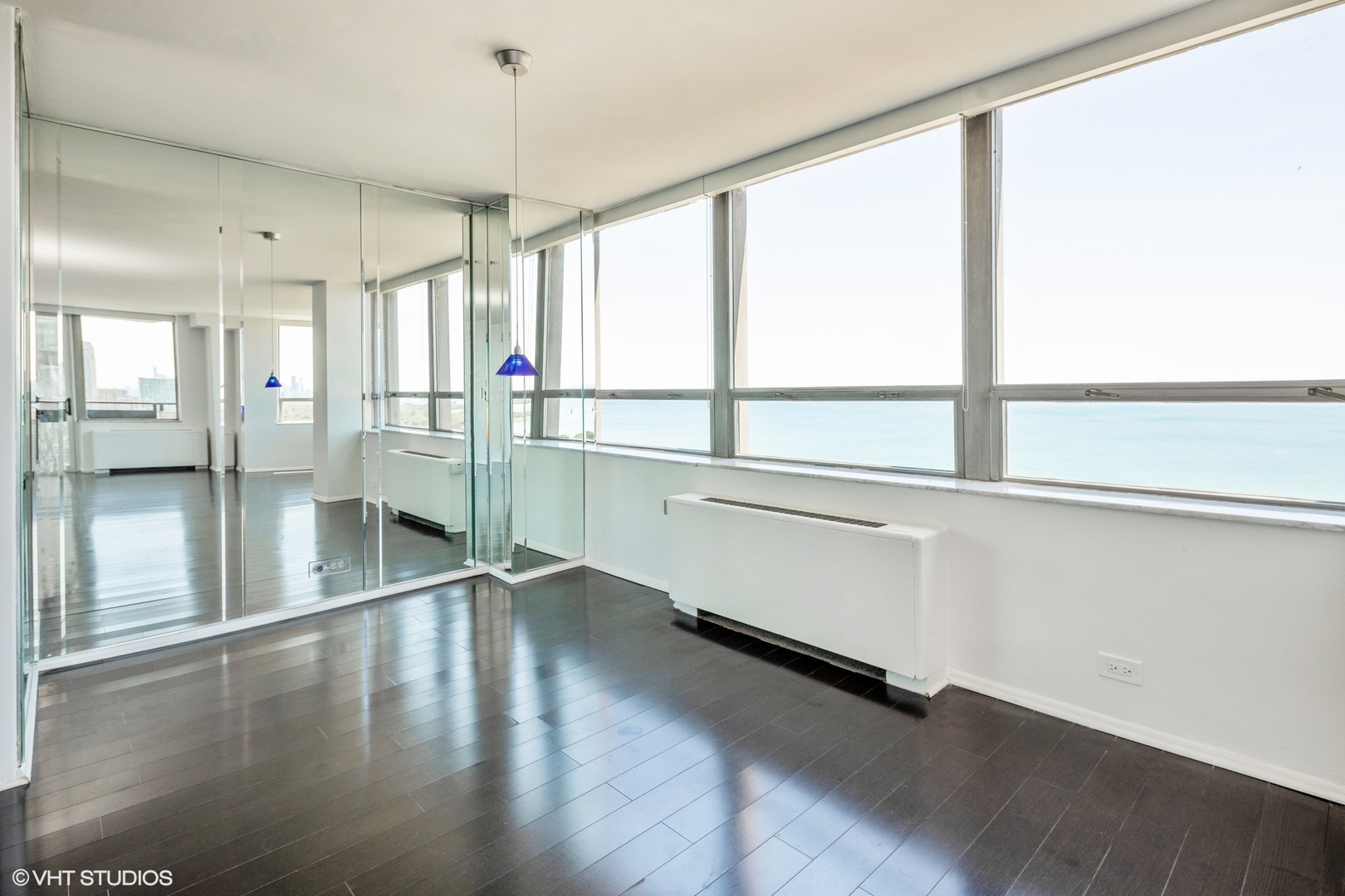 5701 North Sheridan Road, Unit 20J Chicago, IL 60660 - Photo 9 of 25 a view of an entryway with wooden floor