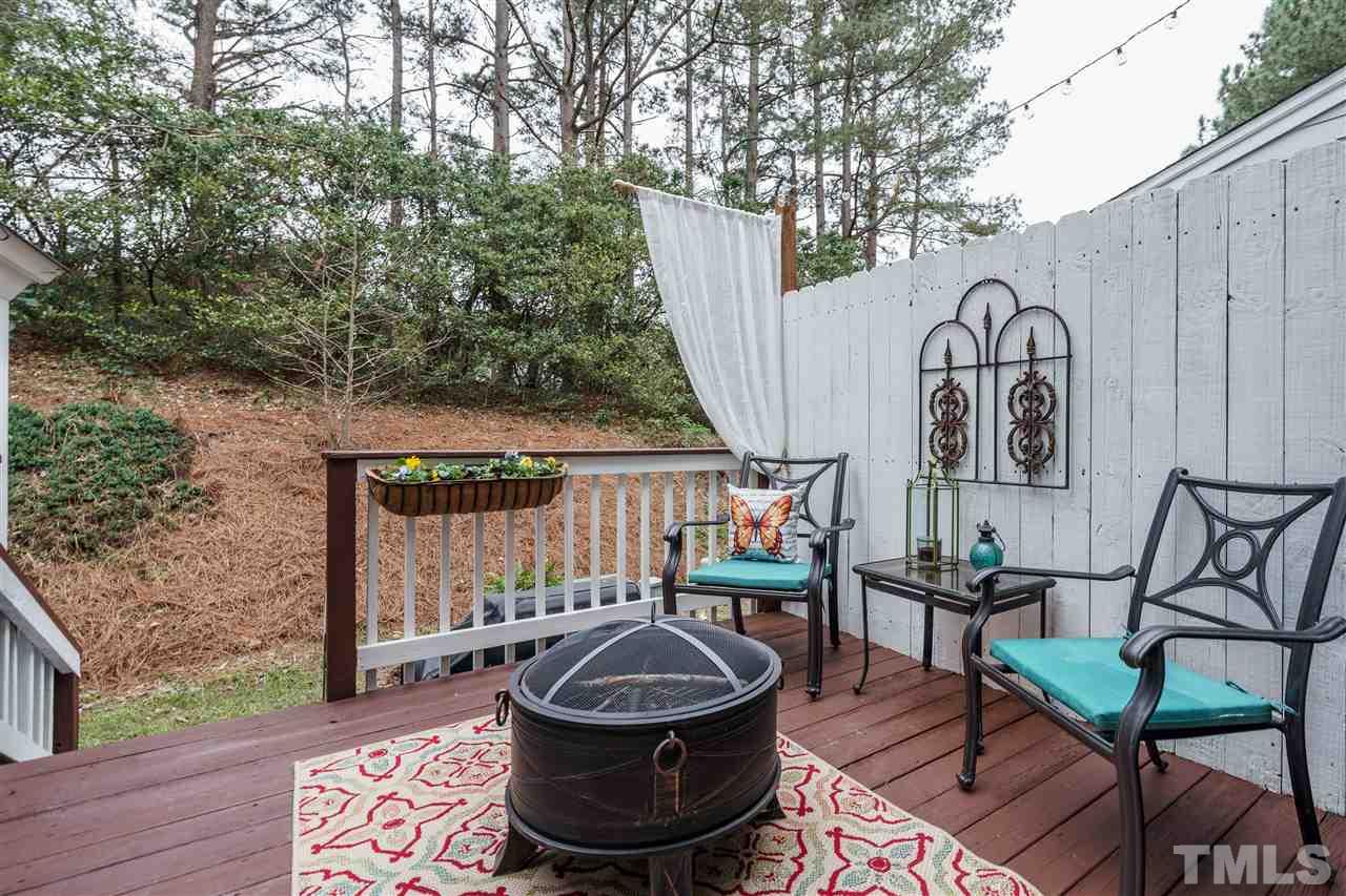 772 Weathergreen Drive Raleigh, NC 27615 - Photo 23 of 26 Enjoy a fire or a glass of wine on this private deck.