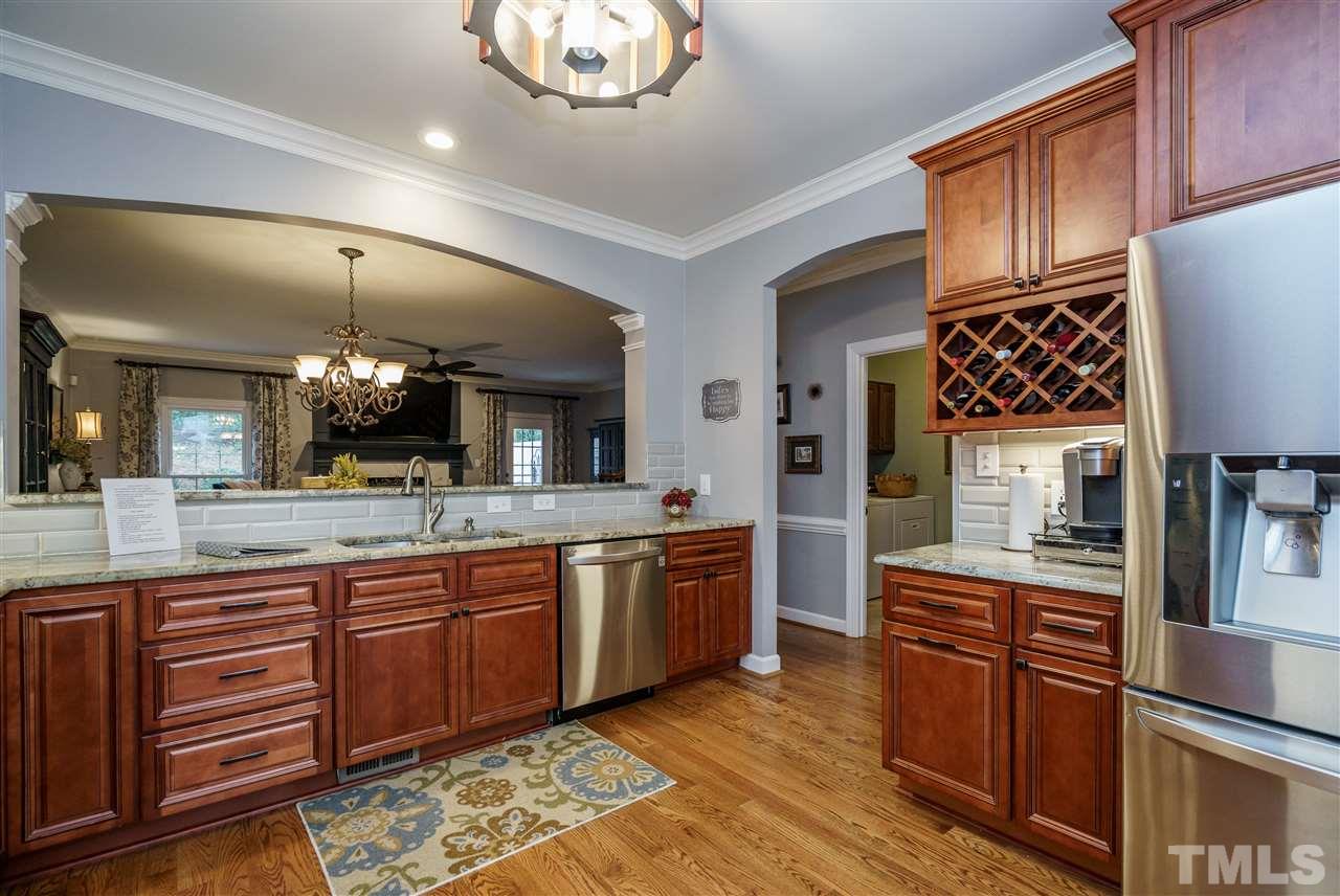 772 Weathergreen Drive Raleigh, NC 27615 - Photo 7 of 26 Built in wine rack.