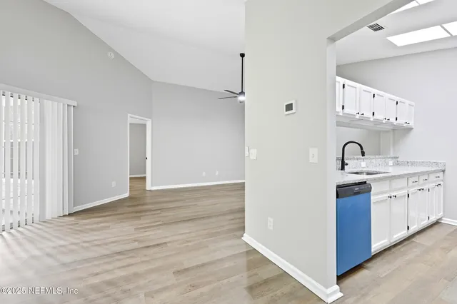 a kitchen with a stove and a microwave