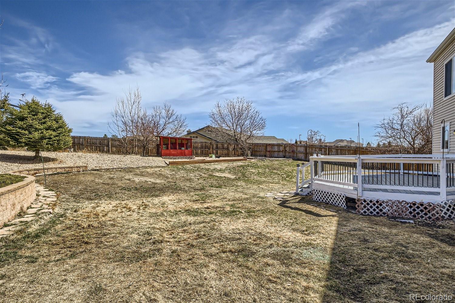 6632 Balance Circle Colorado Springs, CO 80923 - Photo 28 of 28 a view of a house with a yard