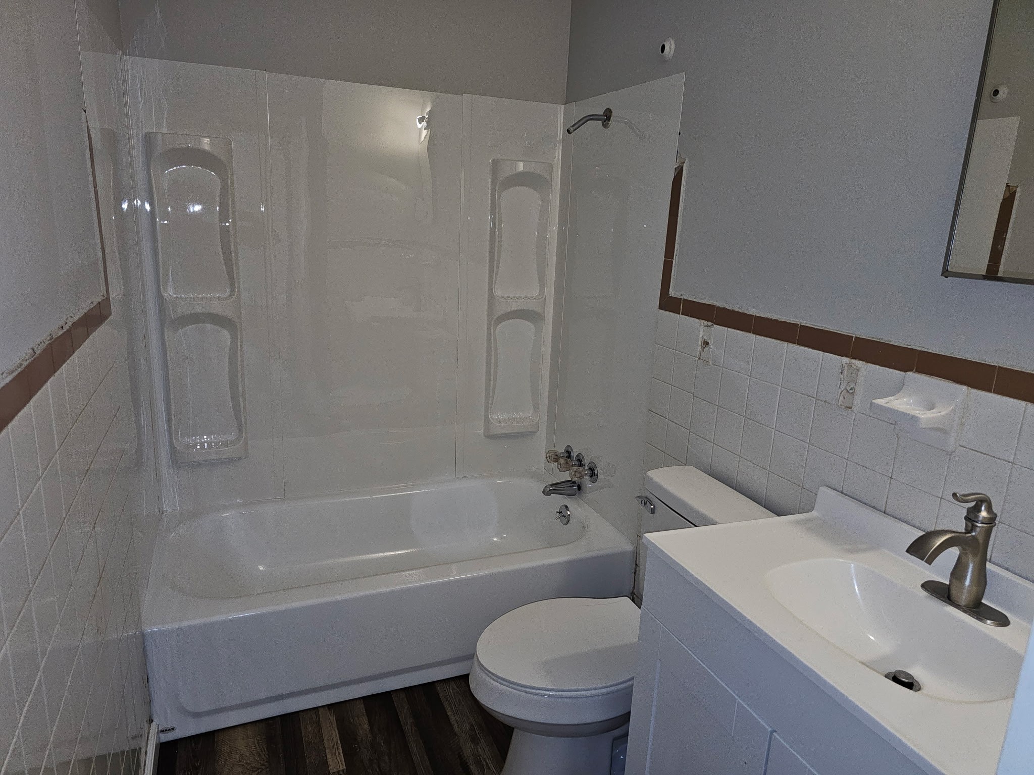 721 Kent Drive Lebanon, TN 37087 - Photo 6 of 8 a bathroom with a sink toilet and shower