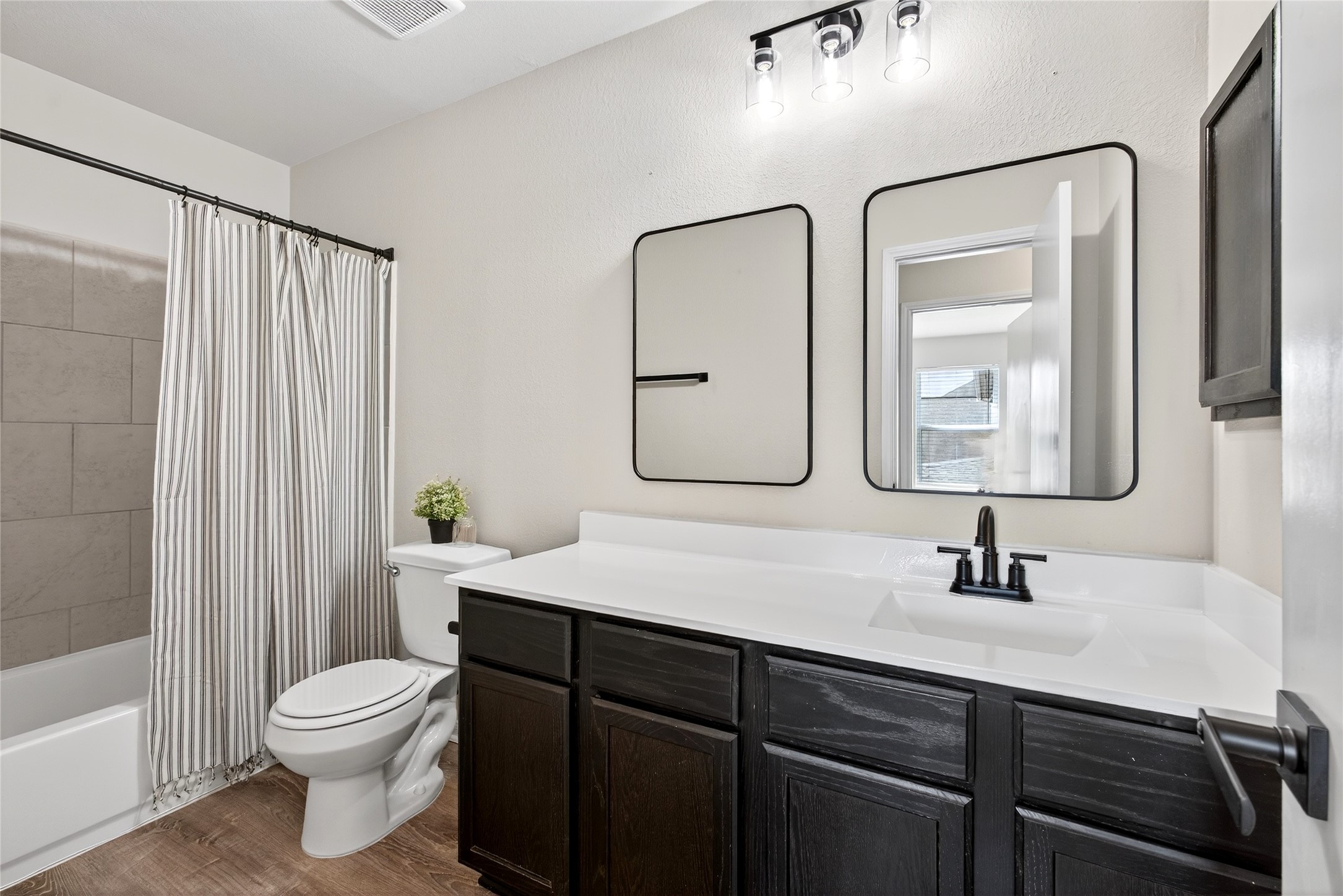 2306 Garden Square Path Spring, TX 77386 - Photo 41 of 49 Upstairs Full Bathroom-New mirrors, refinished counters & tub, and hardware