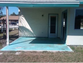 2140 Northeast Clover Palm Bay, FL 32905 - Photo 6 of 8 a view of a house with a yard
