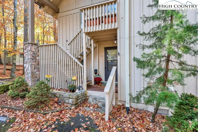 a view of a house with a small garden