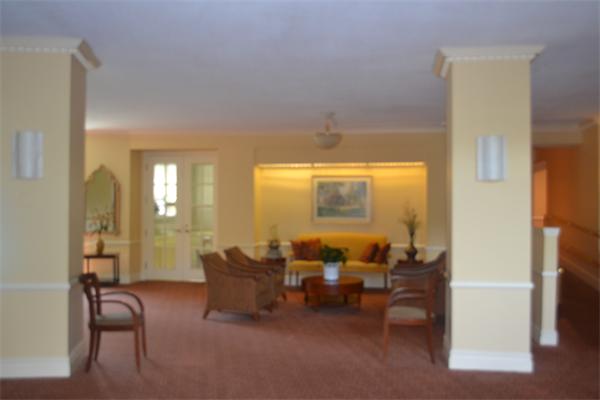 280 Boylston Street, Unit 709 Newton, MA 02467 - Photo 11 of 11 a living room with furniture and a large window