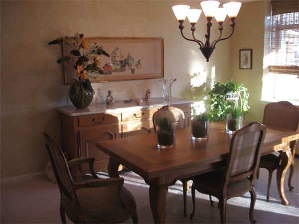 280 Boylston Street, Unit 709 Newton, MA 02467 - Photo 5 of 11 a view of a dining room with furniture and chandelier