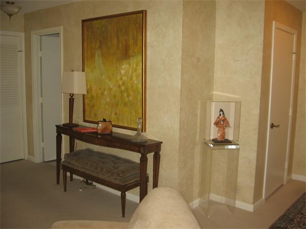 280 Boylston Street, Unit 709 Newton, MA 02467 - Photo 7 of 11 a view of a room with a door and wooden door