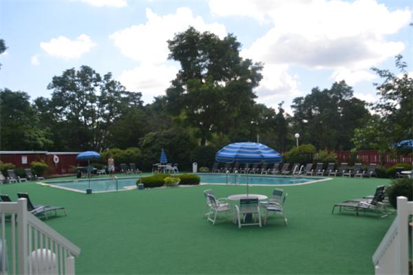 280 Boylston Street, Unit 709 Newton, MA 02467 - Photo 9 of 11 a garden view with a seating space
