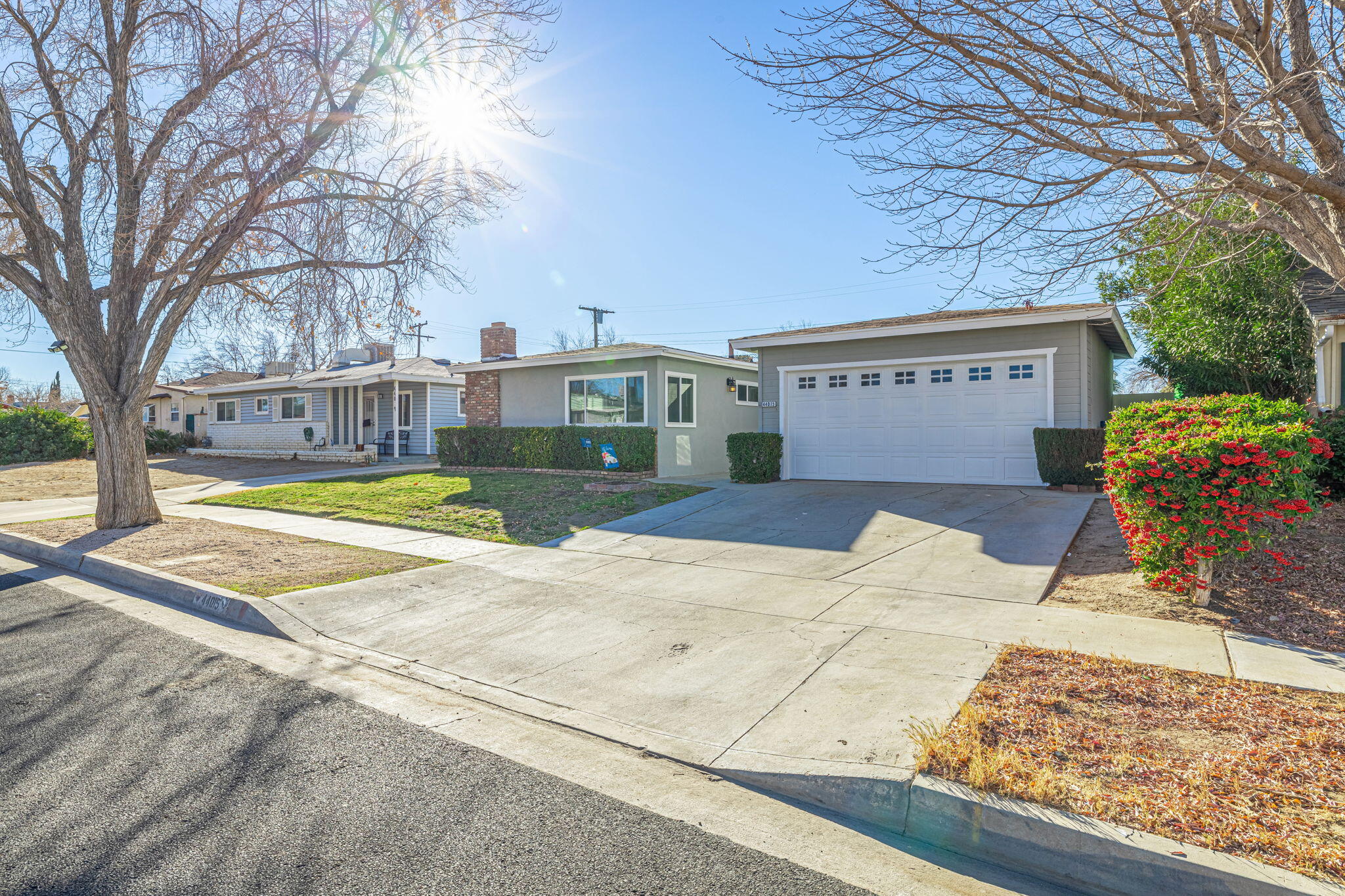 44015 Elm Avenue Lancaster, CA 93534 - Photo 22 of 22 a view of a house with snow on the road