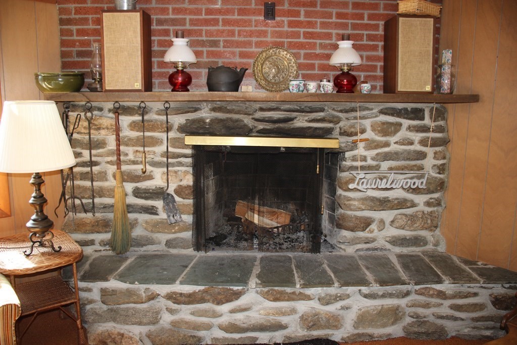 19 Ford Hill Road Rowe, MA 01367 - Photo 13 of 41 a stove top oven sitting inside of a room