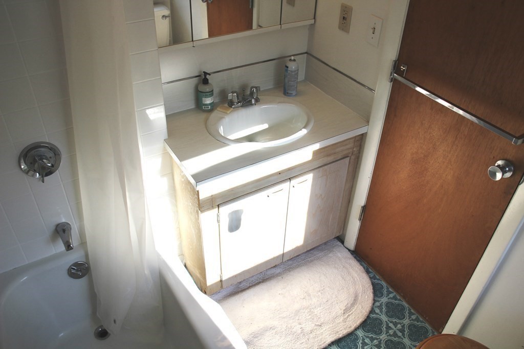 19 Ford Hill Road Rowe, MA 01367 - Photo 27 of 41 a bathroom with a sink and a mirror