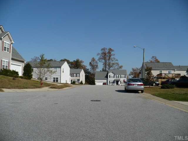 5908 Athens Clark Way Raleigh, NC 27610 - Photo 3 of 3 a view of road with card parked