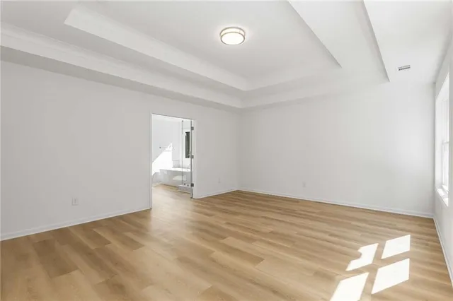 a view of room with window and walk in closet