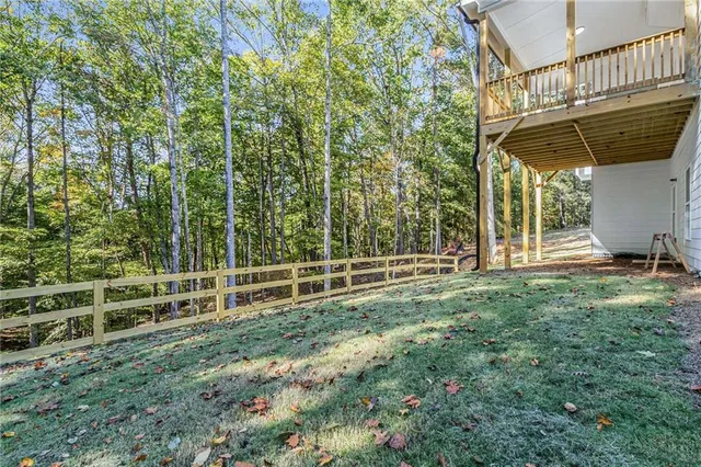 a front view of a house with yard