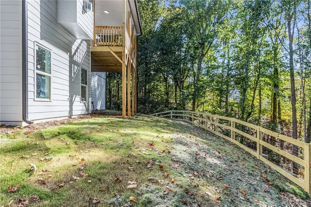 an aerial view of a house with swimming pool and mountain view
