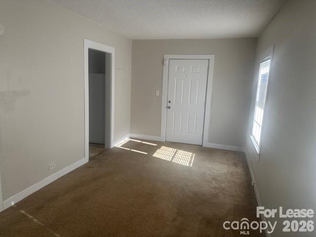 4911 Monroe Road Charlotte, NC 28205 - Photo 6 of 15 a view of an empty room and window